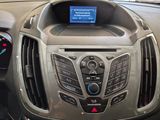 the dashboard of a car with a blue screen in the center