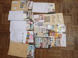 a lot of mail sitting on the floor on the floor