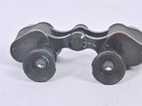 a pair of binoculars that are sitting on a table