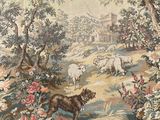 a picture of a tapestry with a picture of a dog and sheep