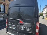 a van that is parked on the side of the road