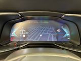 the dashboard of a car with a digital display on it