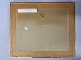 an old picture of a box with a piece of paper on it
