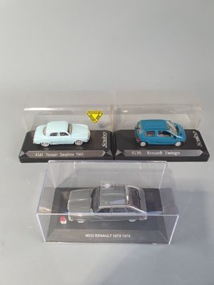 two toy cars that are in a clear box