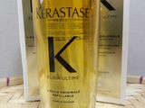 the bottle of kerastasee is next to a box of kerastasee