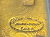 an image of a close up of a gold bar on a table