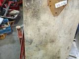 a picture of a piece of metal in a garage