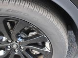 a close up of a tire on a car ' s rim