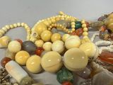 a lot of beads that are laying on a table