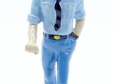 a figurine of a man dressed in a police uniform
