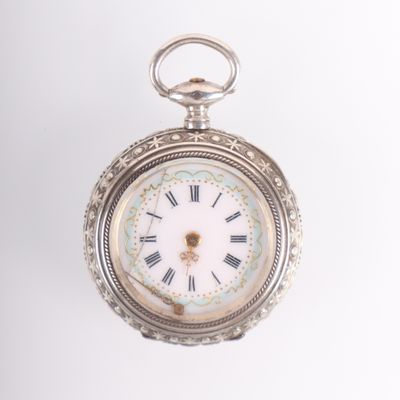 a silver pocket watch with roman numerals on the face