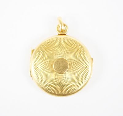 a yellow gold locke with a circular design on the front