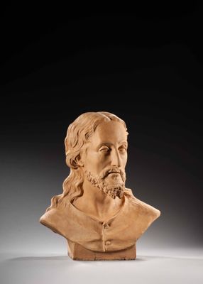 un buste sculpté représentant un homme barbu