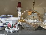 many plates and bowls on the counter in this room