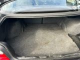 a trunk of a car with the trunk open
