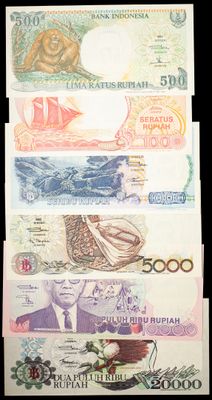four different bank notes with a picture of a man and a woman