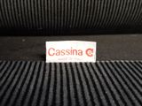 the label on the back of a black chair that says cassina made in italy