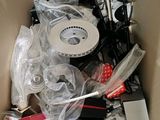 a cardboard box filled with assorted items in it