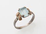 a close up of a ring with a stone on it