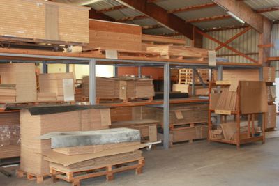 a large warehouse with a lot of boxes on the shelves