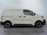 a white van that is parked in a parking lot