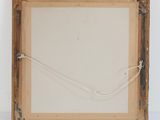an old picture frame with a rope hanging from it ' s side