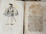 a book with a drawing of a man holding a sword