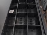a black tray that has a lot of trays in it