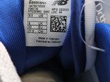 a close up of a pair of shoes with a label on them