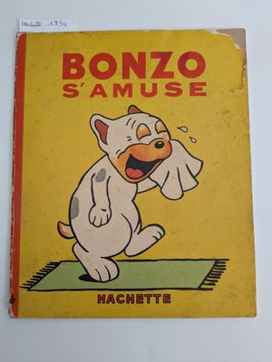 un vieux livre pour enfants avec un chien de bande dessinée sur la couverture