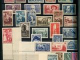 an old picture of a collection of stamps with a picture of a man on it