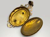 pair of antique brass oval lockes with gold leaf decoration