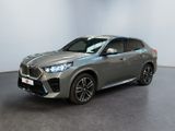 the new bmw x1 suv is parked in a showroom