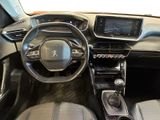 the interior of a car with a steering wheel, dashboard and dashboard controls