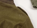 the jacket is green and brown with a brown collar