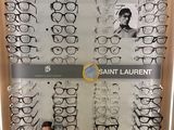 a close up of a display case with many pairs of glasses