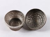 pair of silver plated bowls on white background with white background