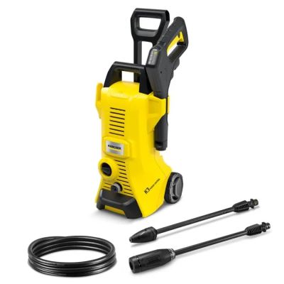 a yellow pressurer with a hose and a black hose