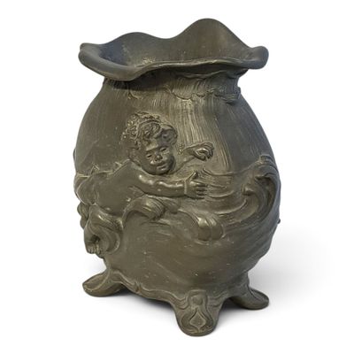 a small vase with a lid on a white background