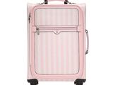 an image of a pink suitcase on wheels on a white background