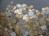 a pile of coins sitting on top of a table