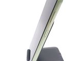 a close up of a cell phone on a stand