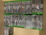 a lot of dvds on a shelf in a box