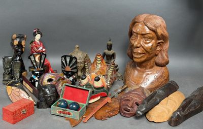 a statue of a man surrounded by various items