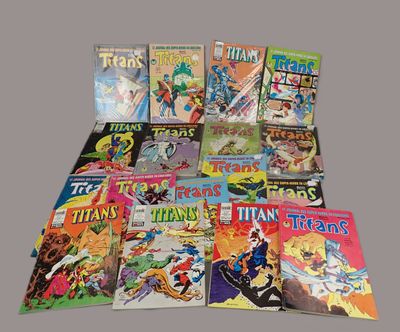 many comic books are stacked on top of each other on a table