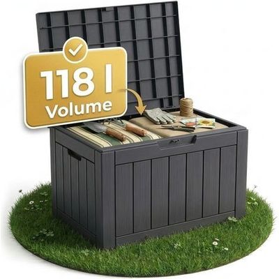 une image représentant une boîte contenant des outils, posée sur un coin de pelouse