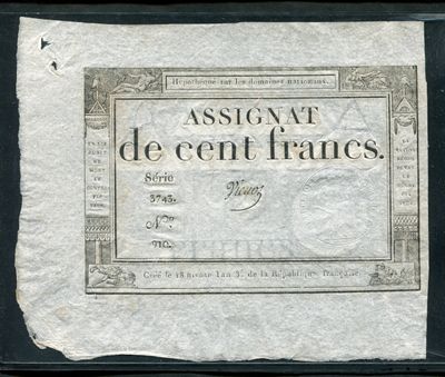 un ancien billet de banque français sur lequel figurent les mots « assignat le cent de France »