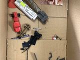 a cardboard box with a bunch of tools inside of it