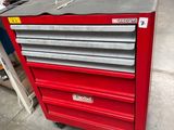an image of a red tool cabinet in a garage