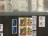 many different stamps on the back of a refrigerator
